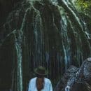 woman gazing at waterfalls