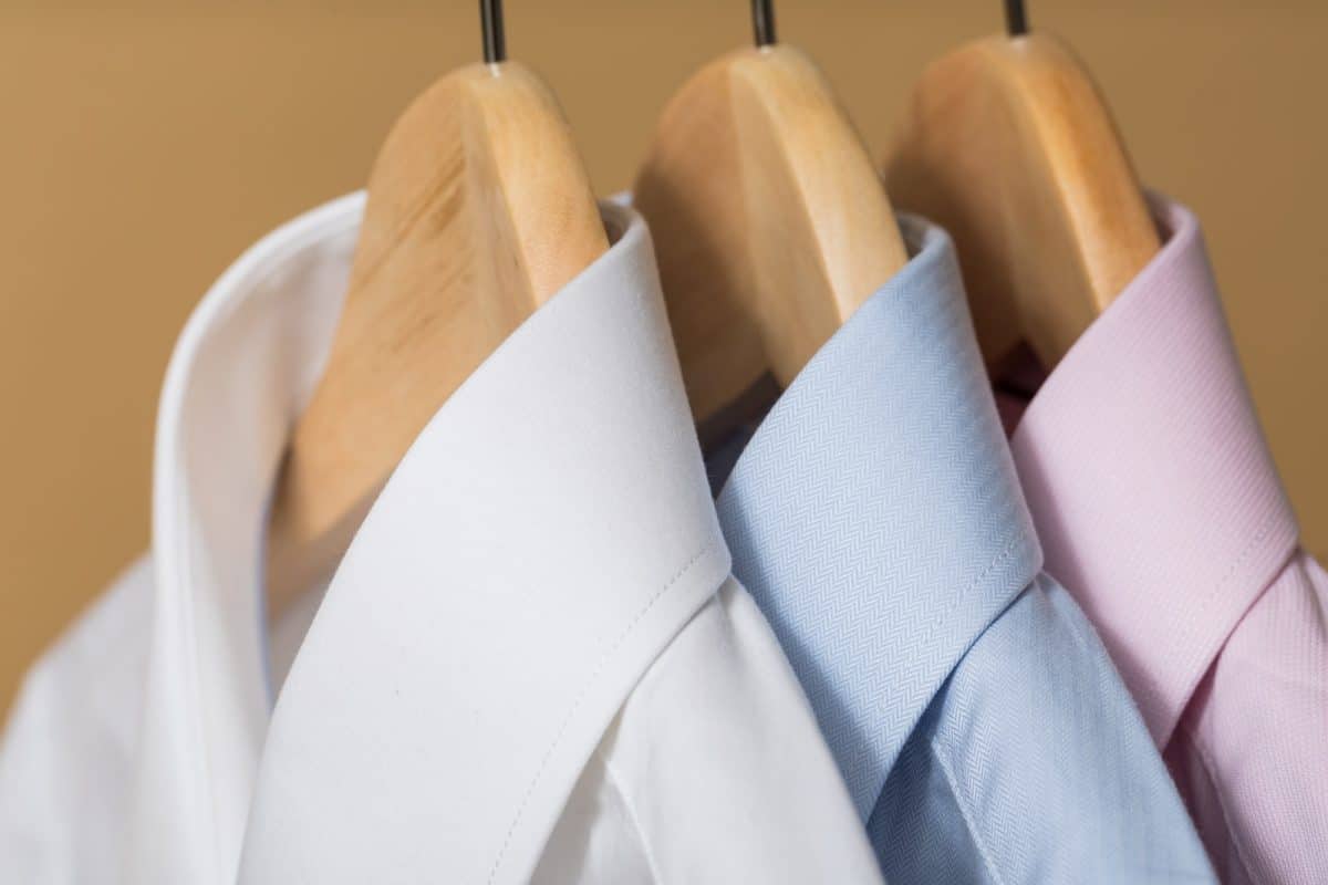 white and purple button up shirt